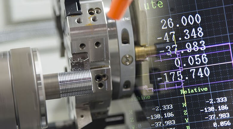 CNC machine spindle with precision measurement display showing coordinate data for Cincinnati Milacron troubleshooting.